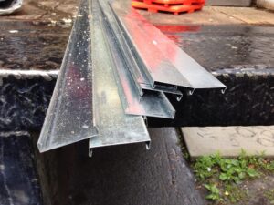 Innovative Metal Strips for Dense Packing Insulation –