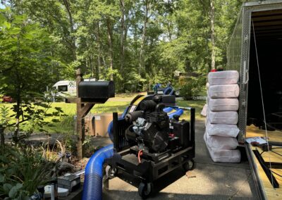 The CoolVac37 vacuum being used to extract fiberglass from a 2,800 sq ft house.